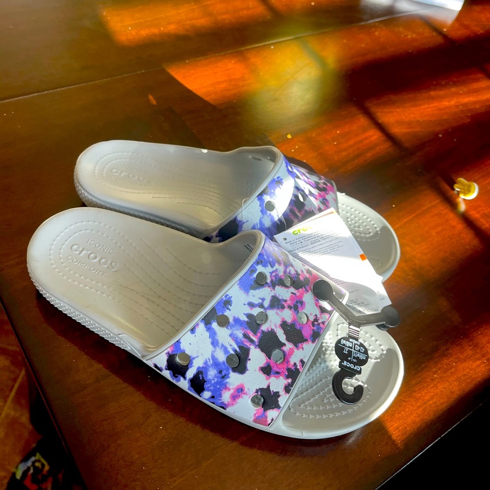 Crocs slides.